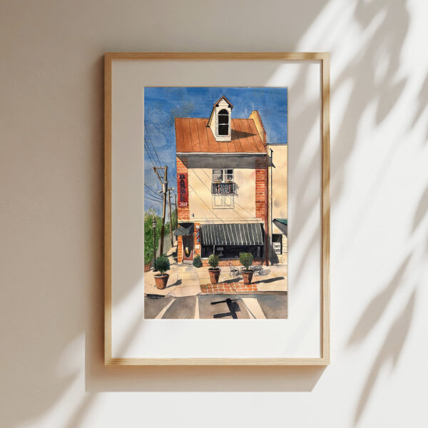 photograph of an original watercolor artwork painting of ralph's barbershop in downtown glenside pa